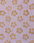 Close up display of linen top with small flower print, fabric.