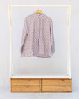 Display of linen top with small flower print.