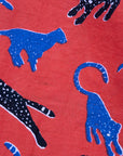 Close up display of red cat print culotte, fabric.