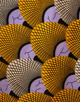 Close up display of orange and purple dress, fabric.