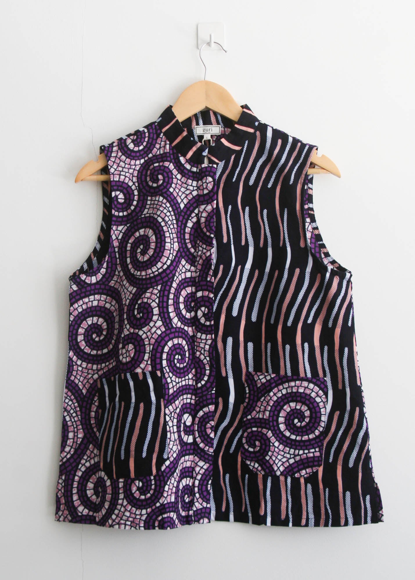 Spin Around Sleeveless Shirt