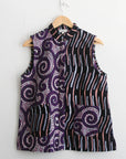 Spin Around Sleeveless Shirt