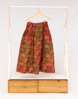 Display of multicolored dot print skirt.