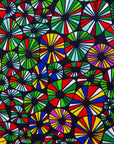 Close up display of navy blue dress with rainbow color umbrella shaped print