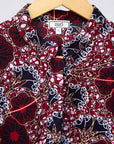 Display of burgundy, white and navy blue floral print dress