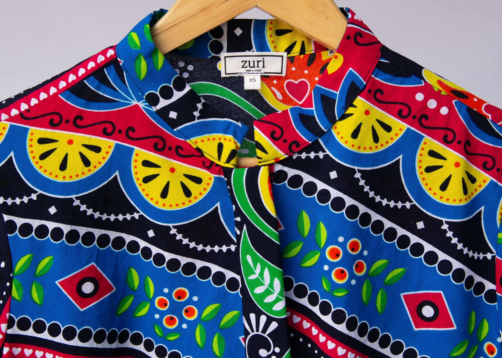 Display of colorful mandala print dress