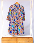 Display of multi-colored paisley print dress