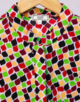 Display of multi-colored scallop tiles print dress