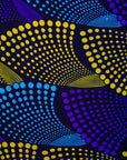Close up display of black dress with purple , yellow and turquoise dotted fans