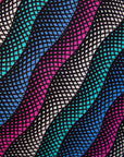 Close up display of pink, blue, turquoise and beige abstract line dress.