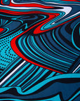 Close up display of turquoise, black, slate, white and red abstract print dress
