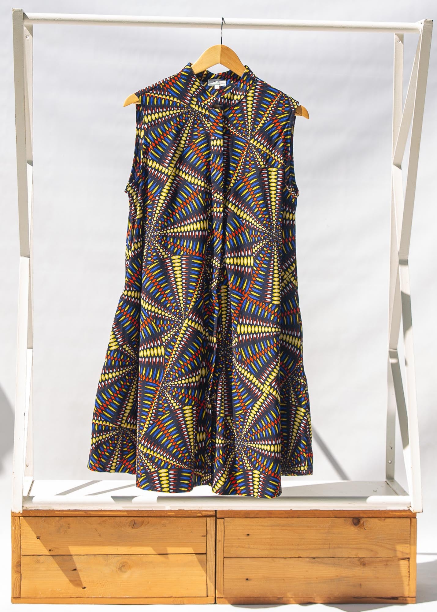 Display of  multi-colored abstract print dress