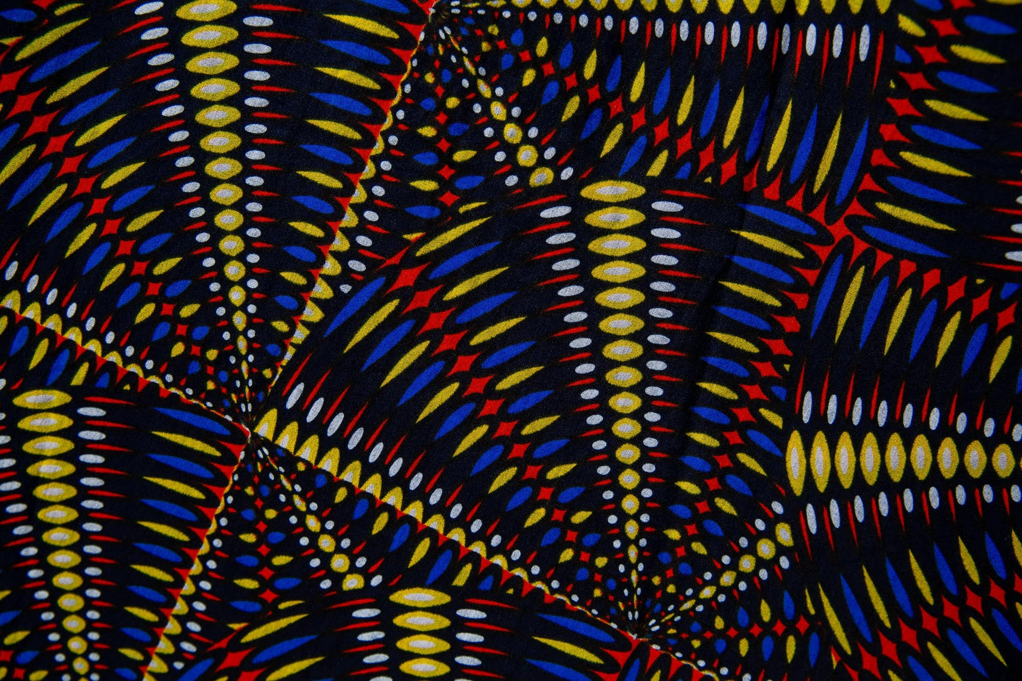 Close up display of  multi-colored abstract print dress
