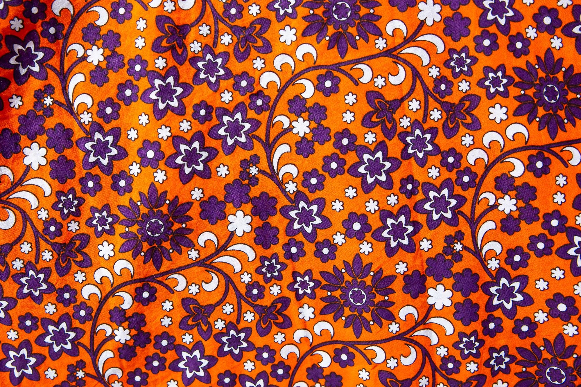 Close up display of multi-colored floral print dress