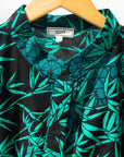 Display of black, blue, green print dress