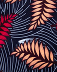Display of navy dress with pink and peach feather print.
