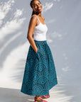 Model wearing blue pants