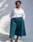 Model wearing blue pants.