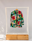 Display of mutlicolor abstract print shirt.