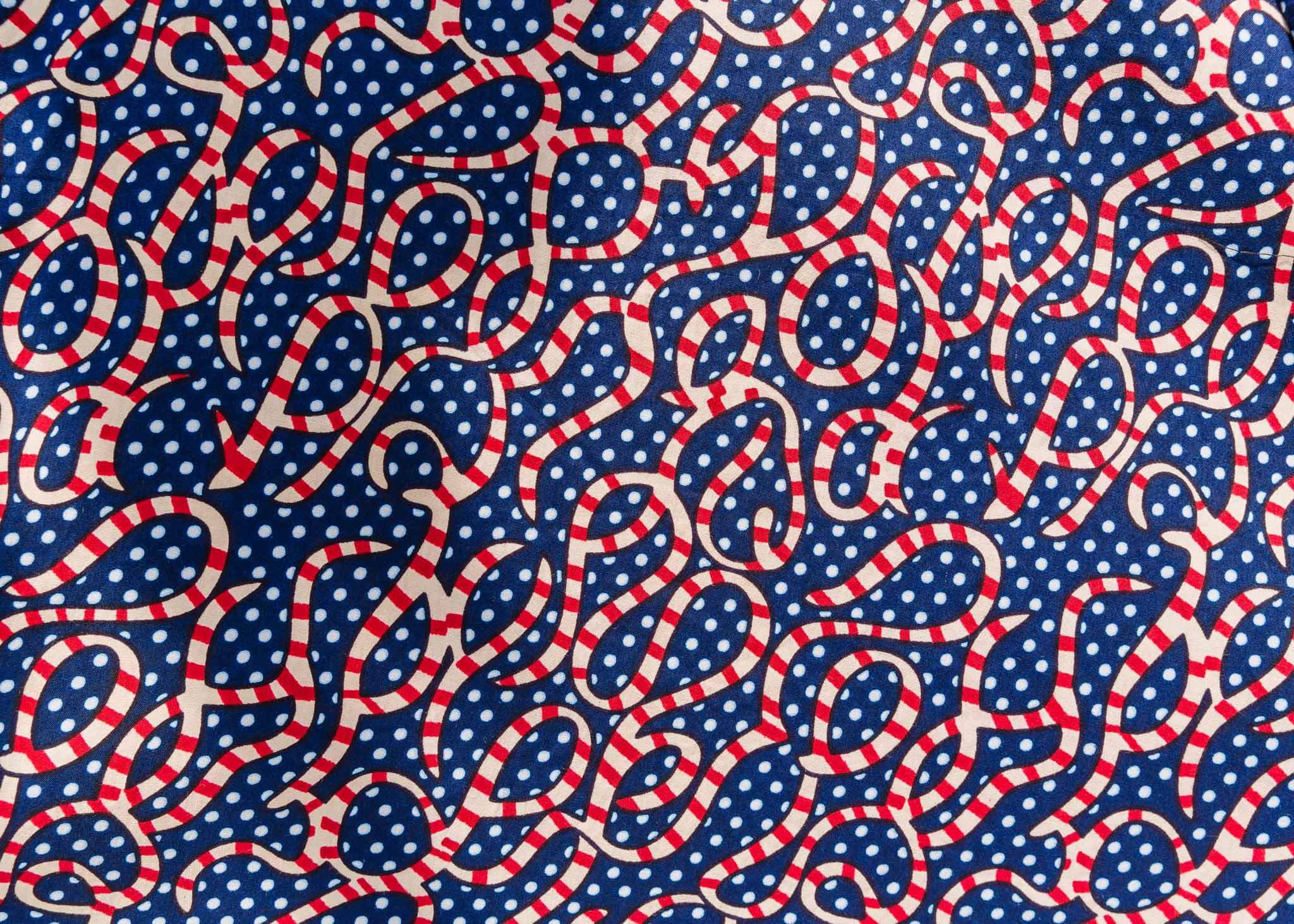 display of blue and red ribbon print dress.