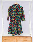 The display of multicolored leaf print dress