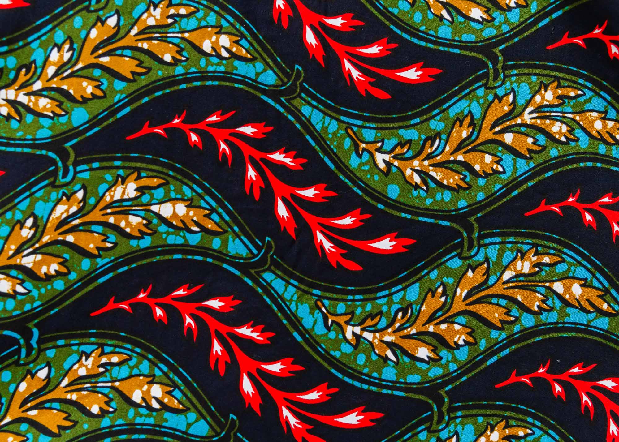 Close up display of multicolored leaf print dress