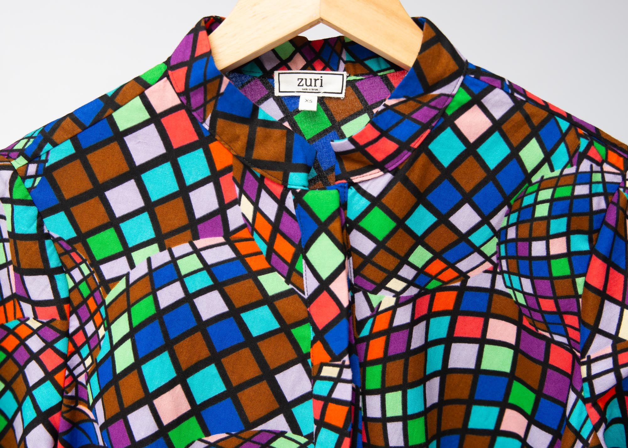 Display of multi colored dress with disco ball print