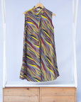 Display of multi-colored abstract print dress