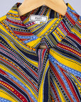 Display of multi-colored abstract print dress