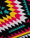 Close up display of multi colored geometric print dress