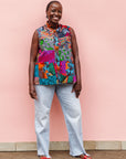 Model wearing patchwork tank.