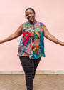 Model wearing patchwork tank.