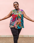 Model wearing patchwork tank.