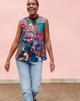 Model wearing patchwork tank.