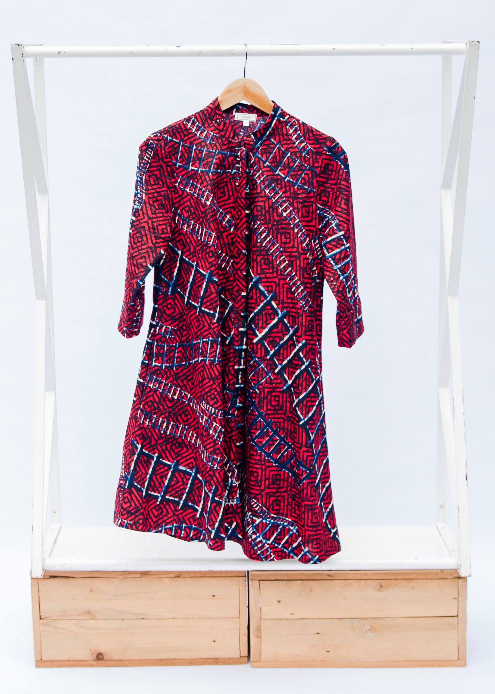 display of a red ladder design dress