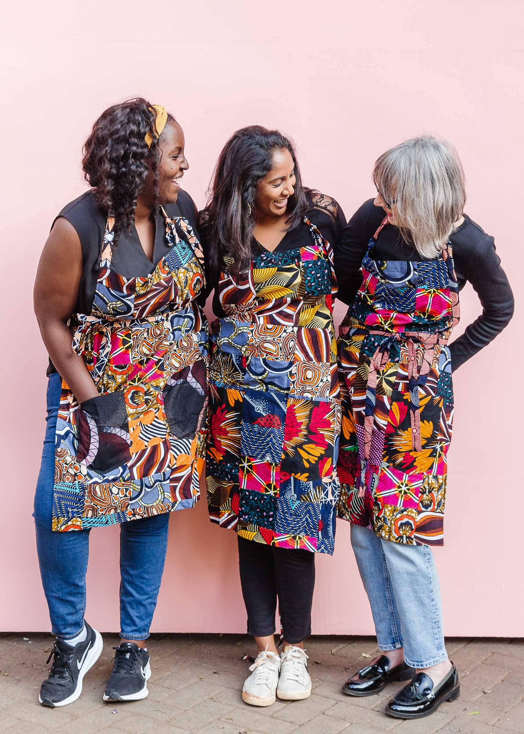 Models wearing patchwork apron.