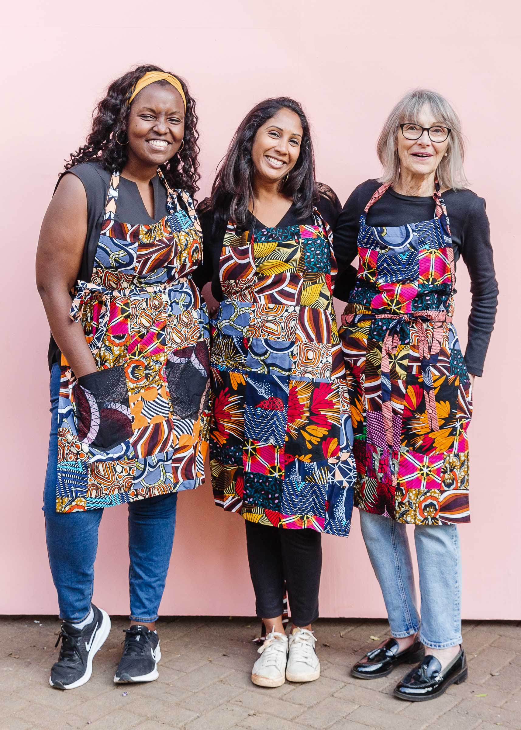 Models wearing patchwork apron.
