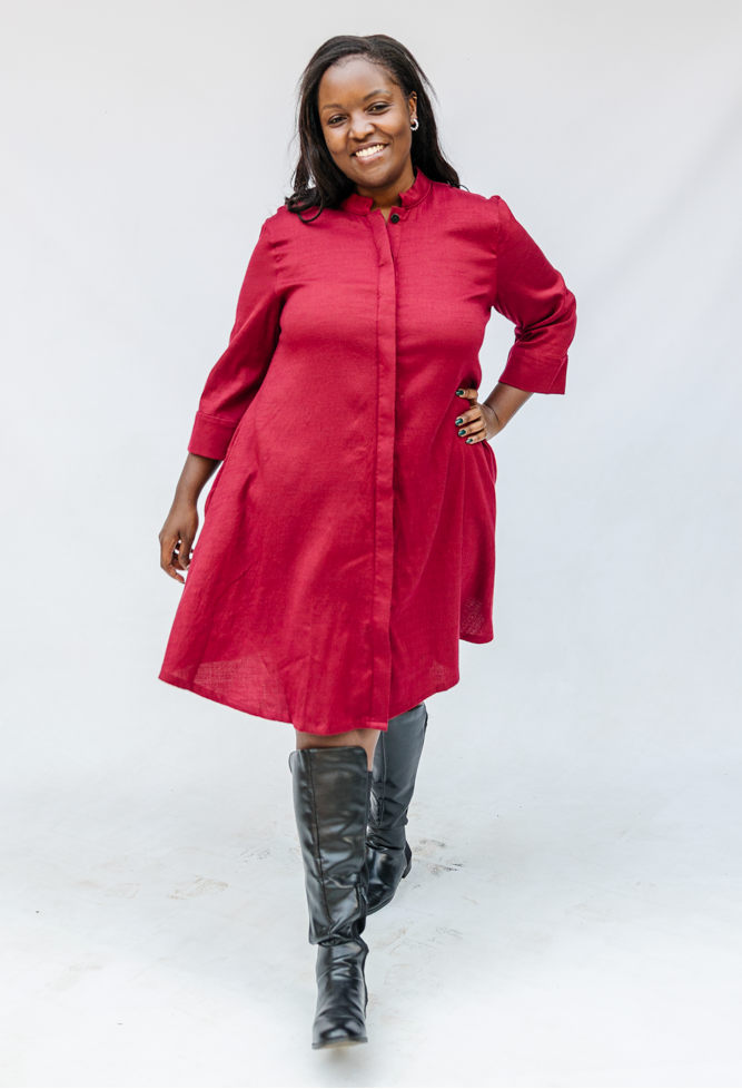 Model wearing burgundy linen dress.