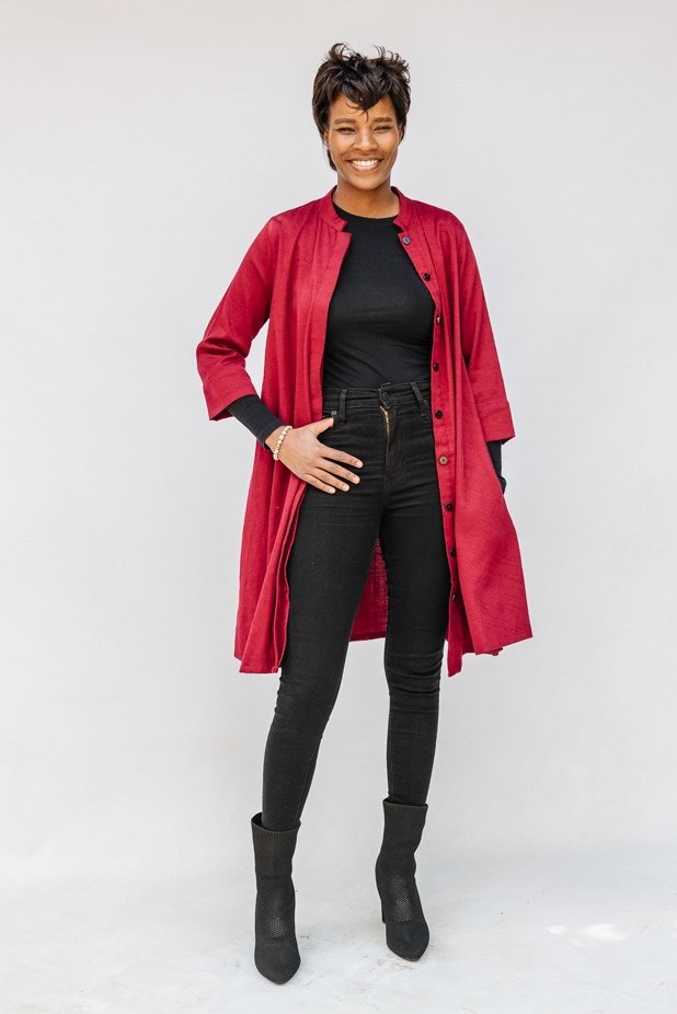 Model wearing burgundy linen dress.