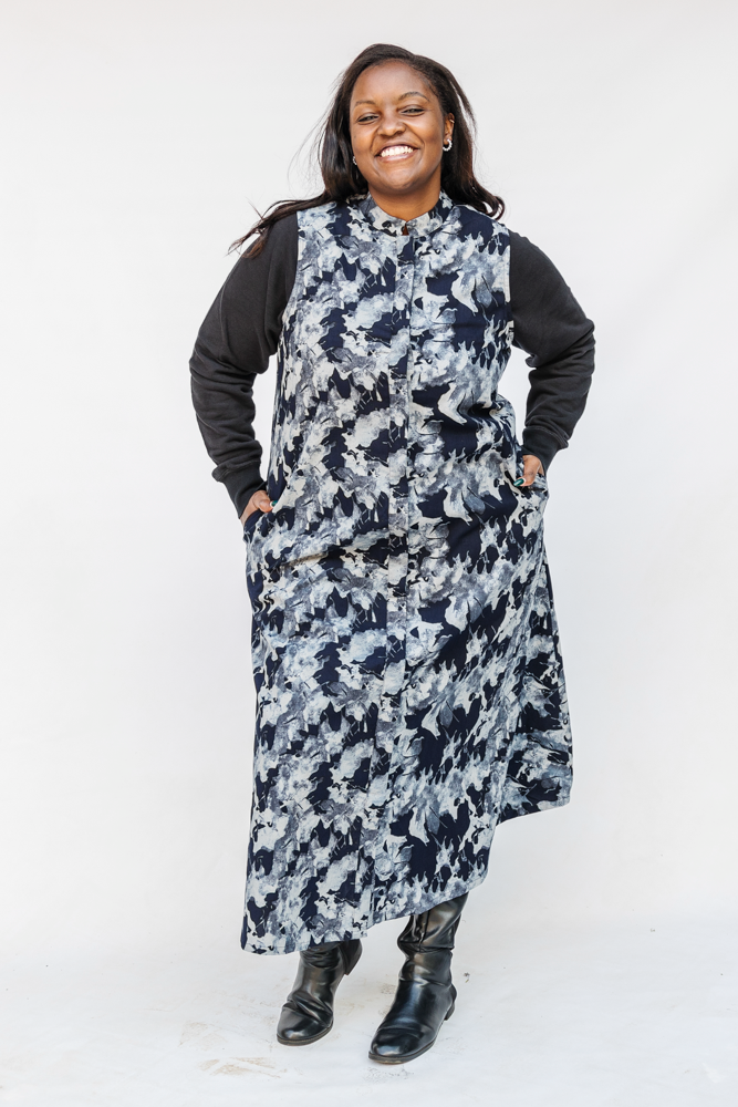 Model wearing navy and gray abstract print maxi dress.