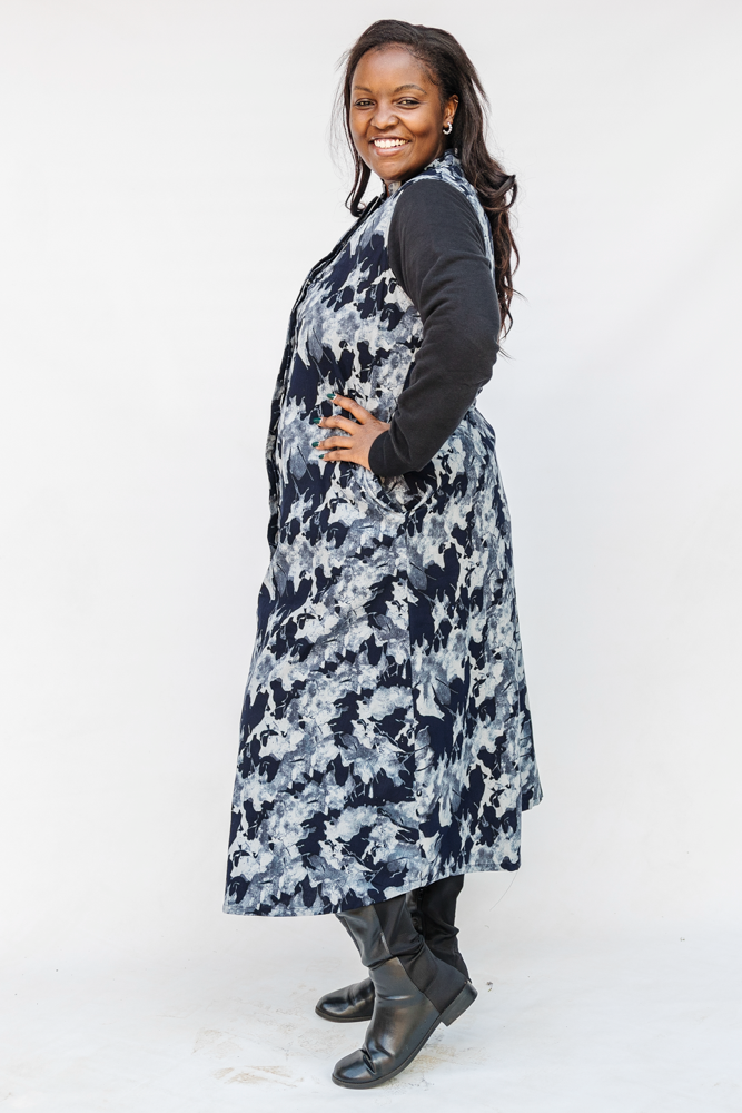 Model wearing navy and gray abstract print maxi dress.