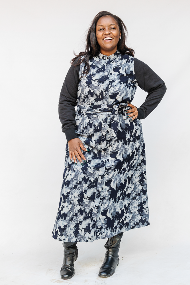 Model wearing navy and gray abstract print maxi dress.