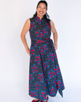 Model wearing floral print maxi dress.