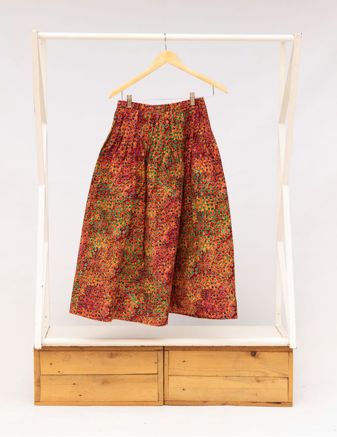 Display of multicolored dot print skirt.