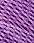 Close up display of purple and pink plaid batik dress, fabric.