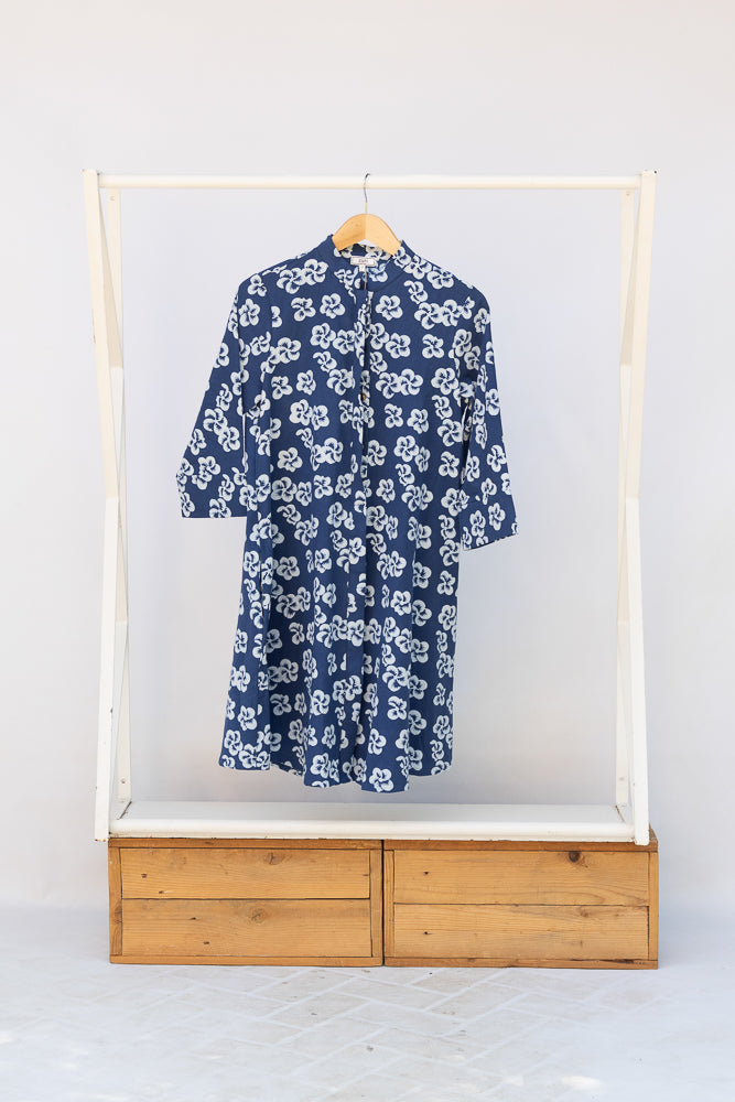 Display of blue and white floral print dress.