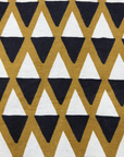 Close up display of black and white triangle print shirt, fabric.