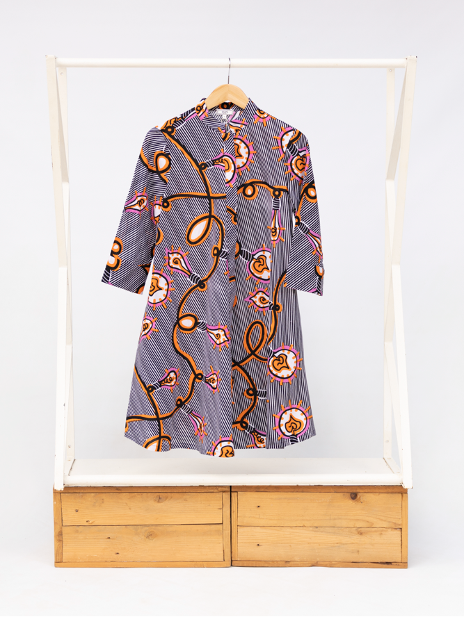 Display of black and white light bulb print dress.