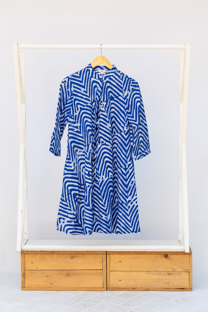 Display of blue and white zigzag print dress.