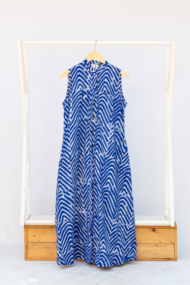 Display of blue and white sleeveless dress.